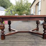 1910s Jacobean style solid oak extending drawer dining table