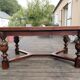 1910s Jacobean style solid oak extending drawer dining table