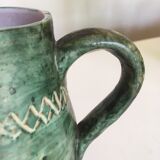 Incised glazed earth pitcher