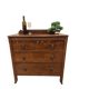 Antique chest of drawers on wheels with wood carving (key top drawer)