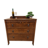 Antique chest of drawers on wheels with wood carving (key top drawer)