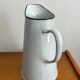 Antique enamelled broc vase