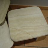 Low tables in travertine