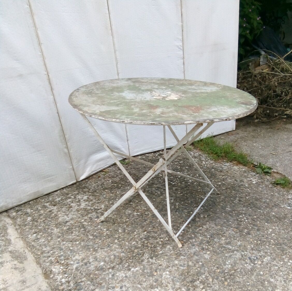 Old folding iron garden table