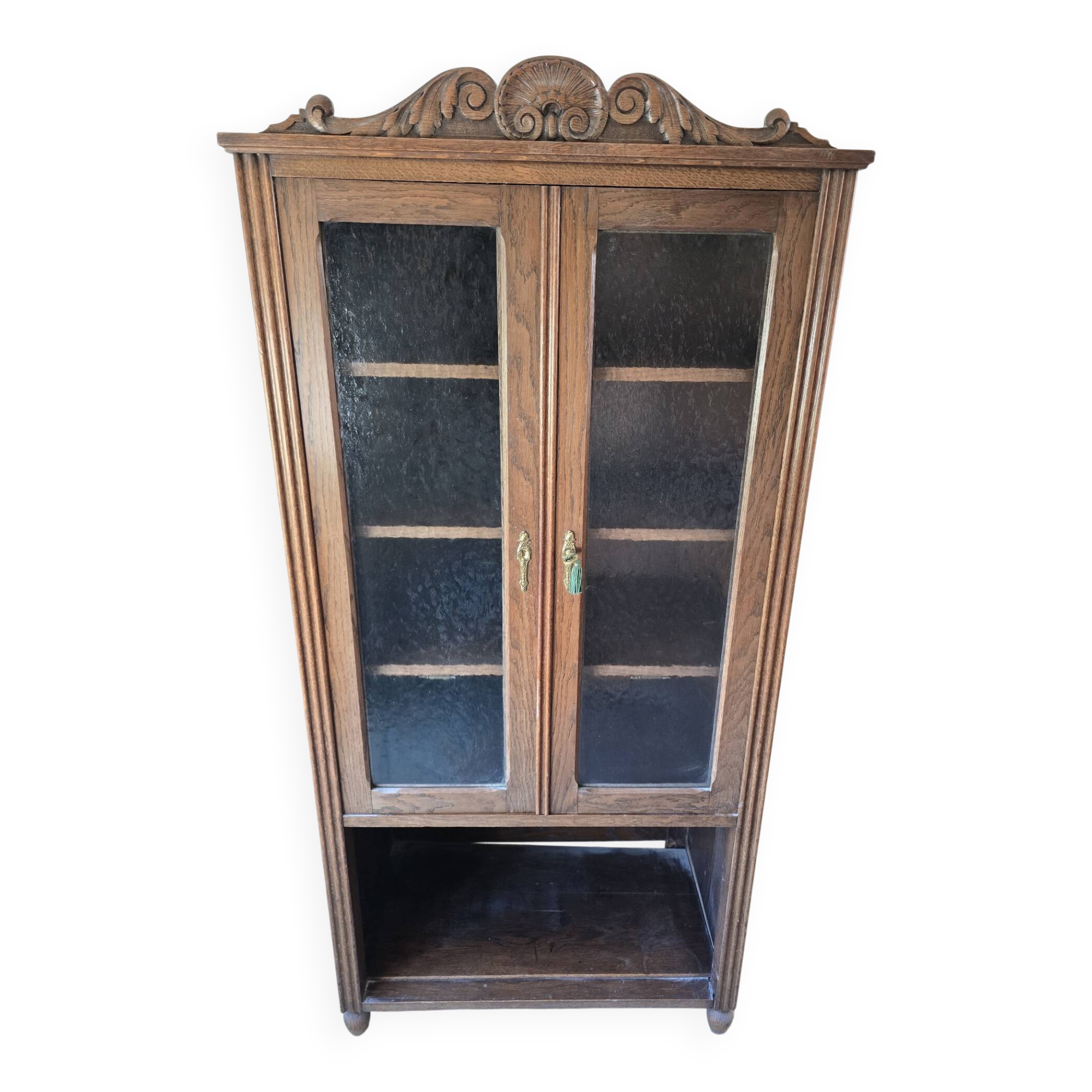 Antique display cabinet in carved oak