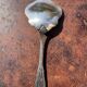 Strawberry spoon or antique Art Nouveau fruit salad in silver metal.