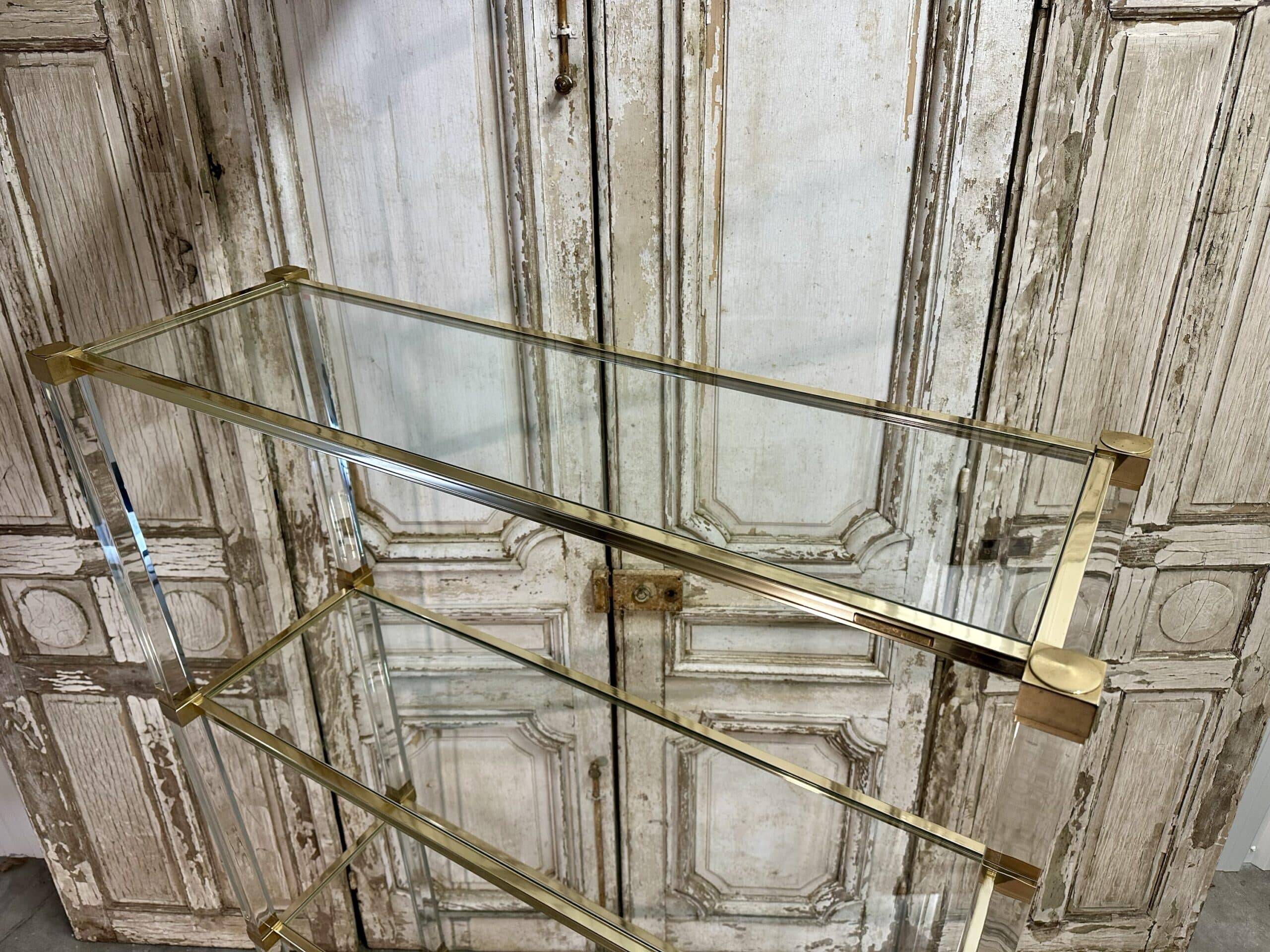 Plexiglass shelf by Pierre Vandel in Hollywood Regency style circa 1970.