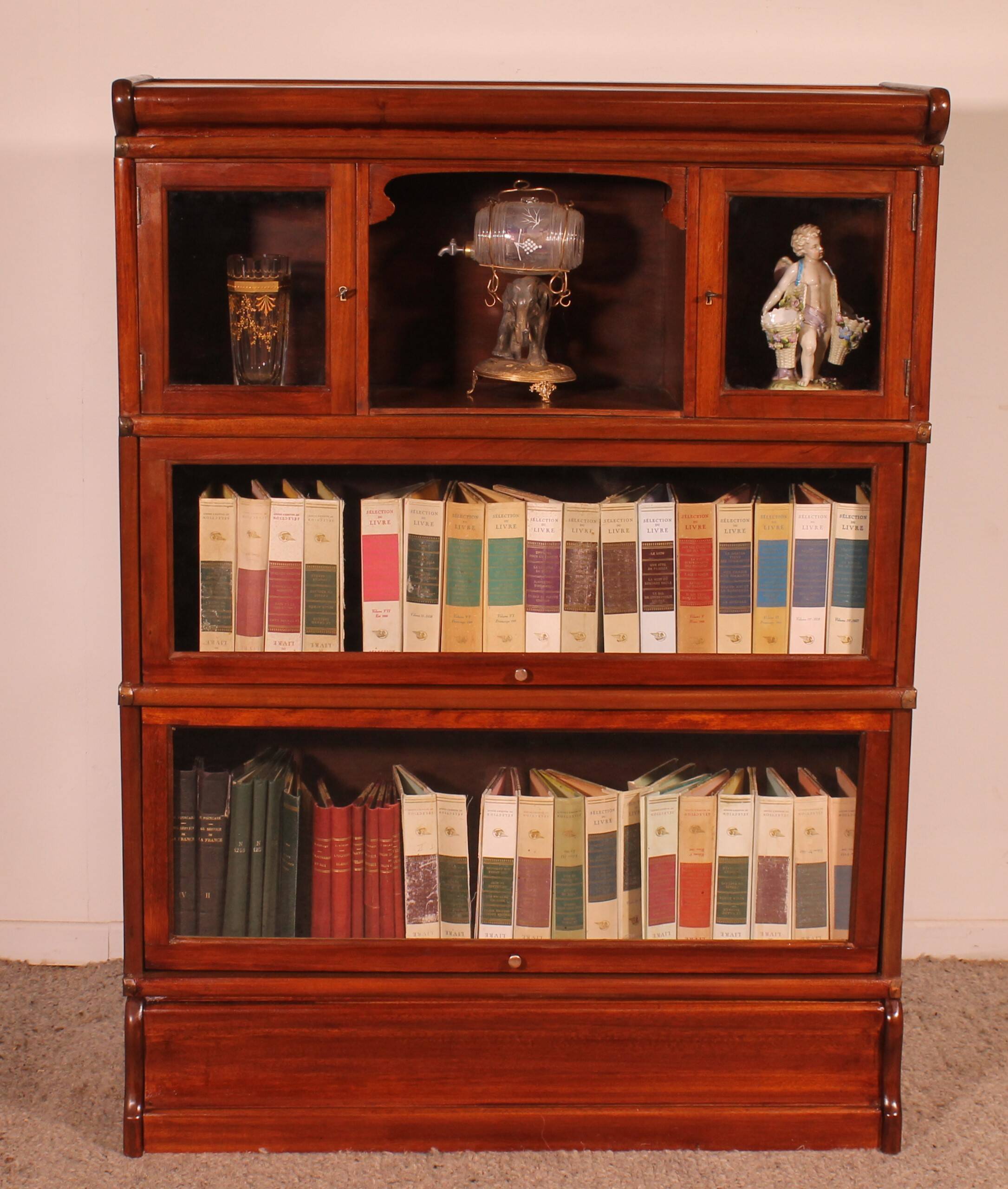 Globe Wernicke Library in Mahogany with 3 pieces and a small cabinet.