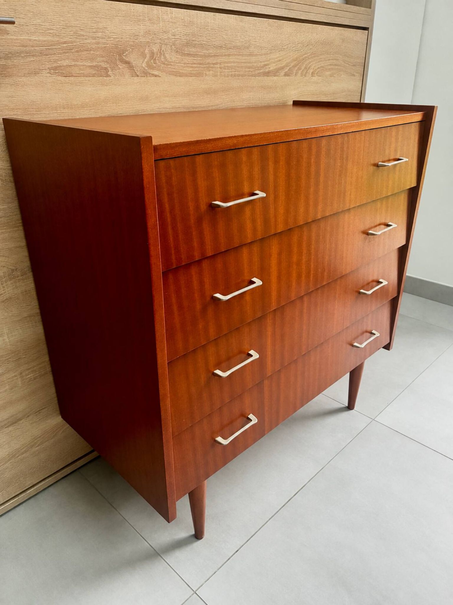 Vintage teak chest of drawers with 4 drawers from the 1960s.