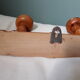 Bamboo-like wall coat rack with 5 mushroom hooks