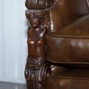 Restored Regency canapé in leather with sculpted Hermès frame.
