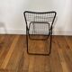 Black metal folding chair