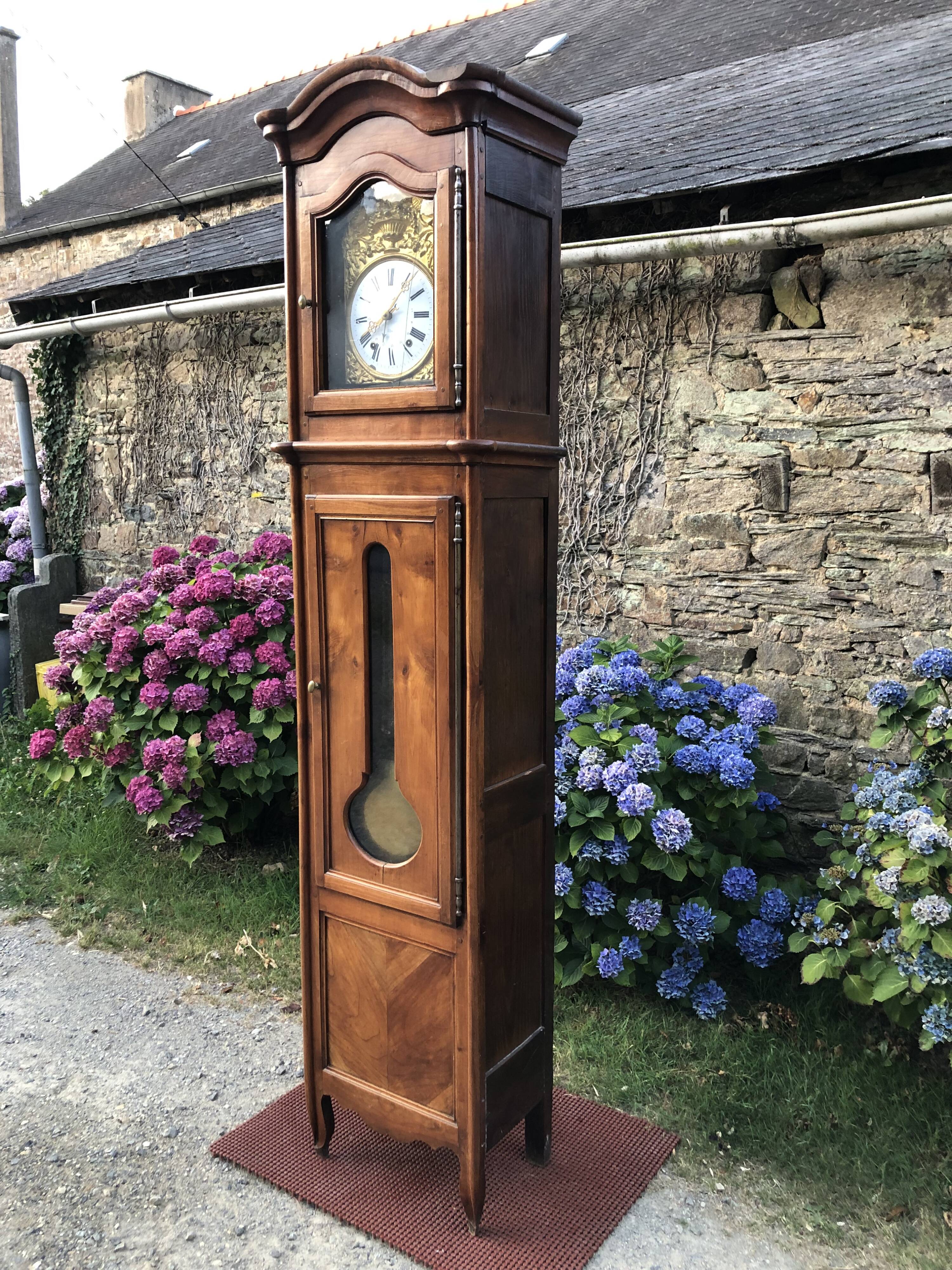 Comtoise clock in cherry style Louis XV period 19th region Fougères.