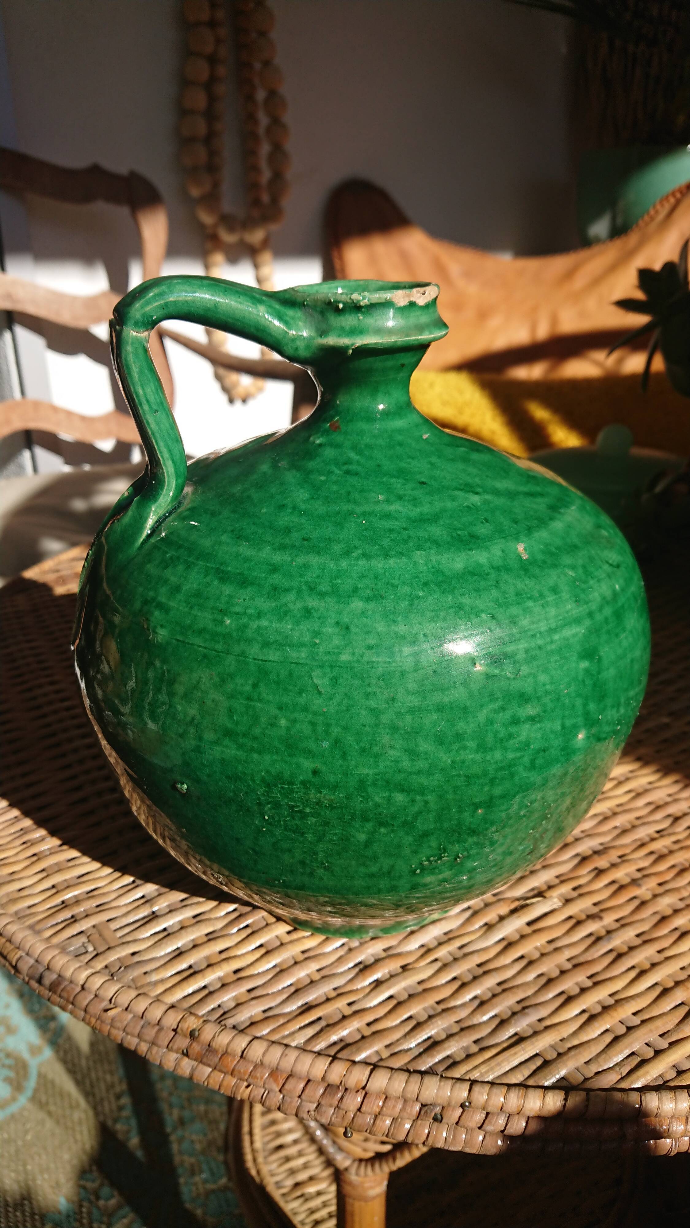 Green enamelled sandstone jug
