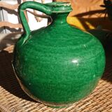 Green enamelled sandstone jug