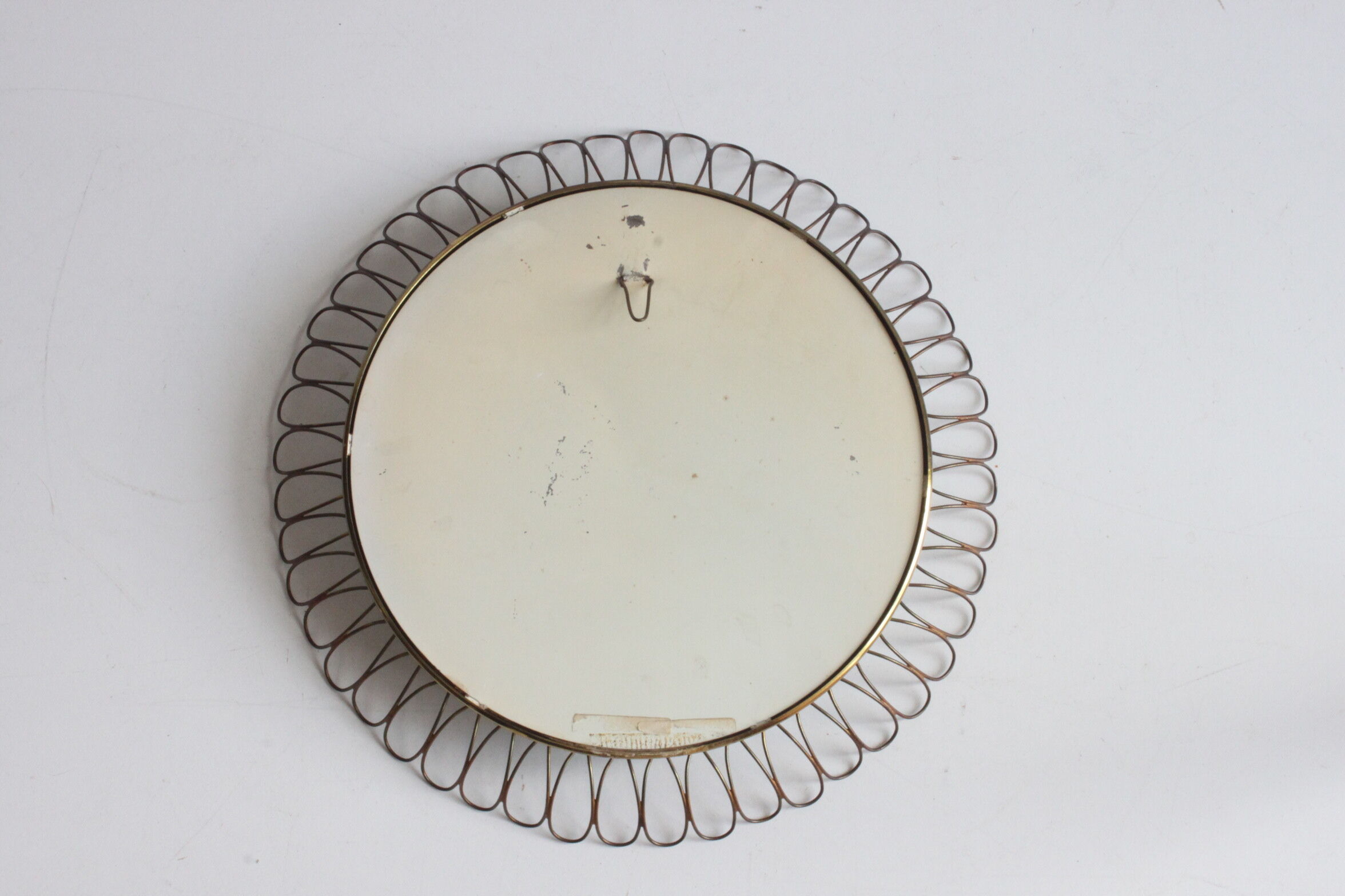 Brass loops mirror by Josef Frank for Svensk Tenn, Sweden 1950s.