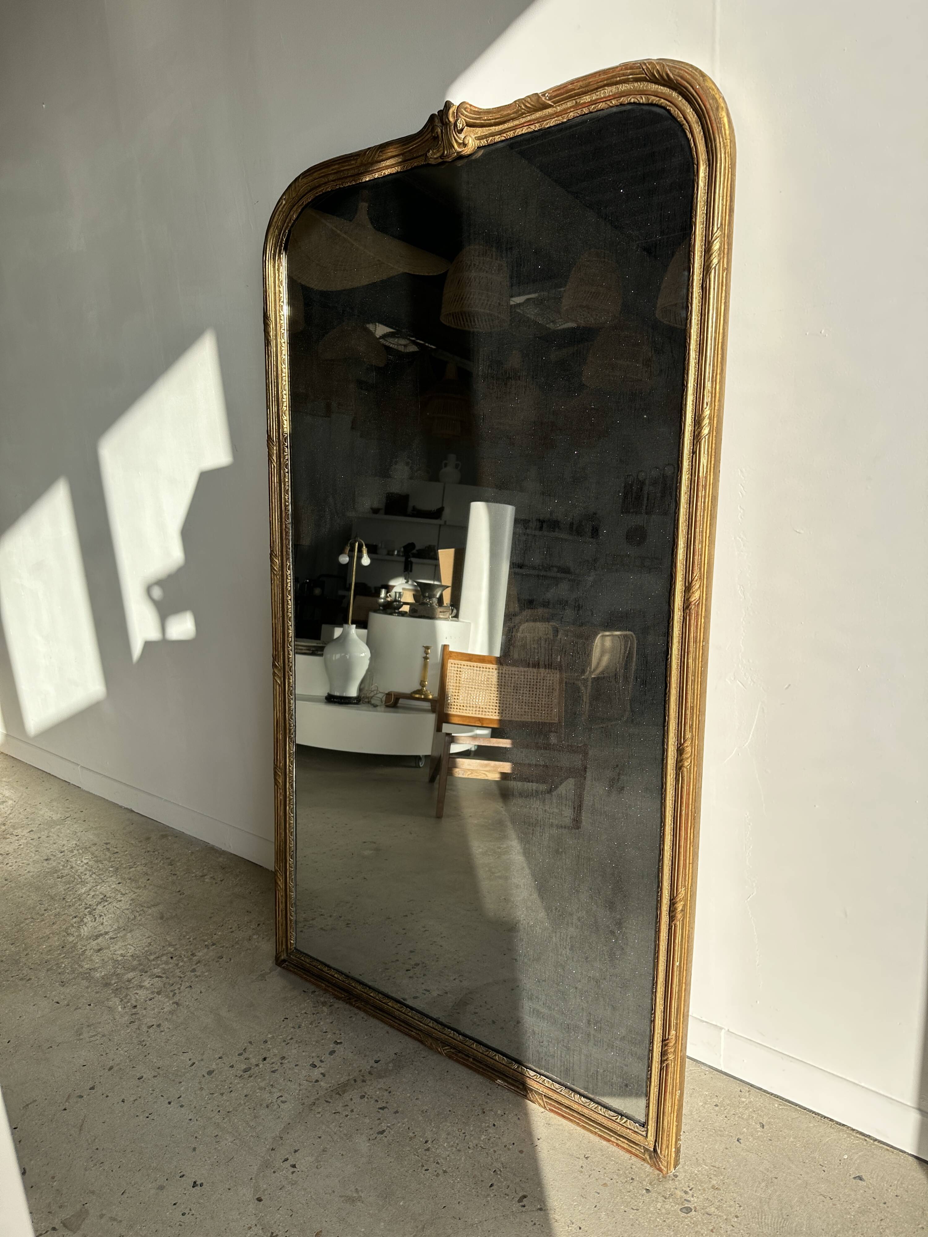 Large gilded mirror 19th century rounded corners mercury glass Louis XVI style