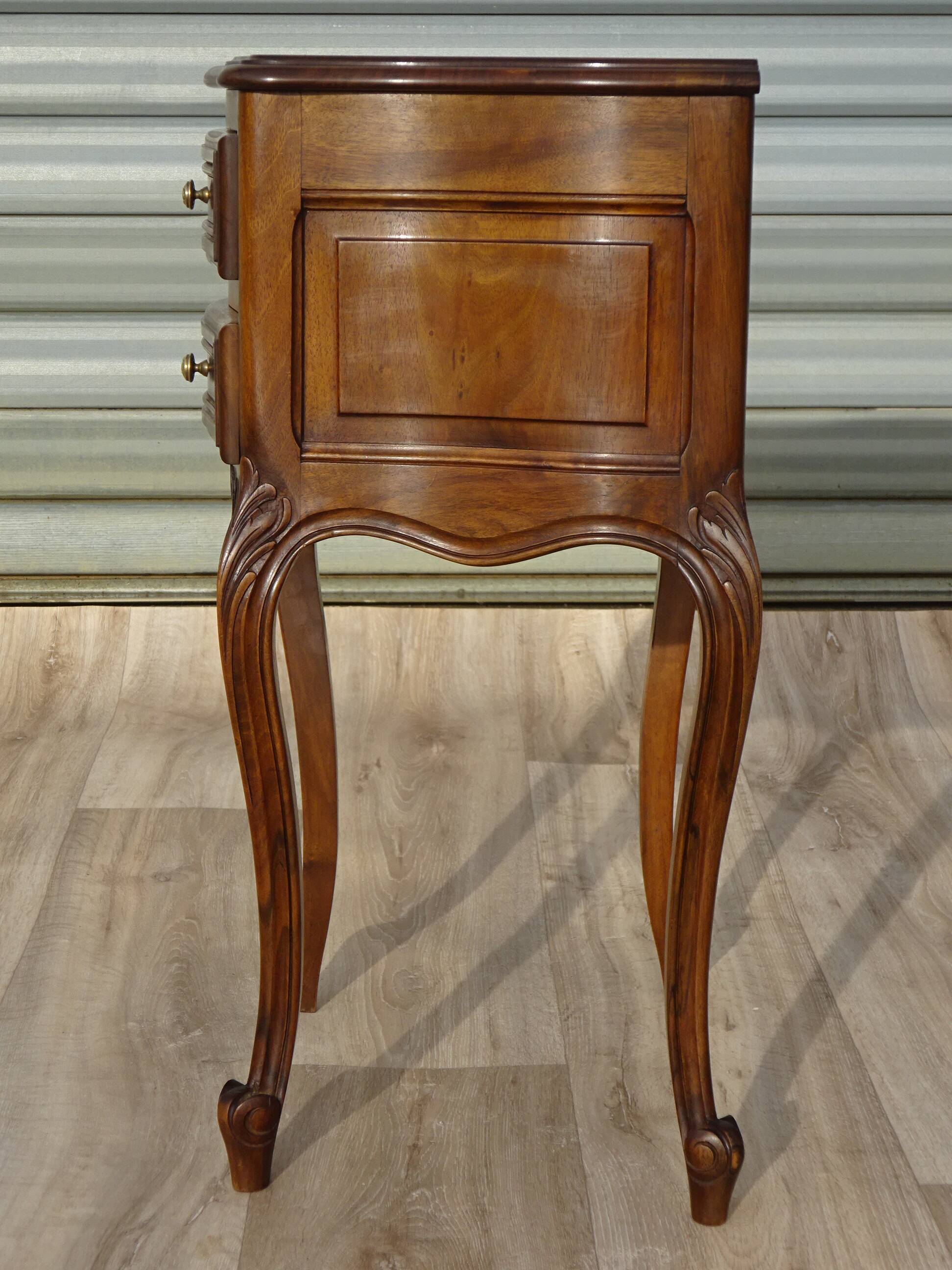 Small walnut bedside table in Louis XV style.