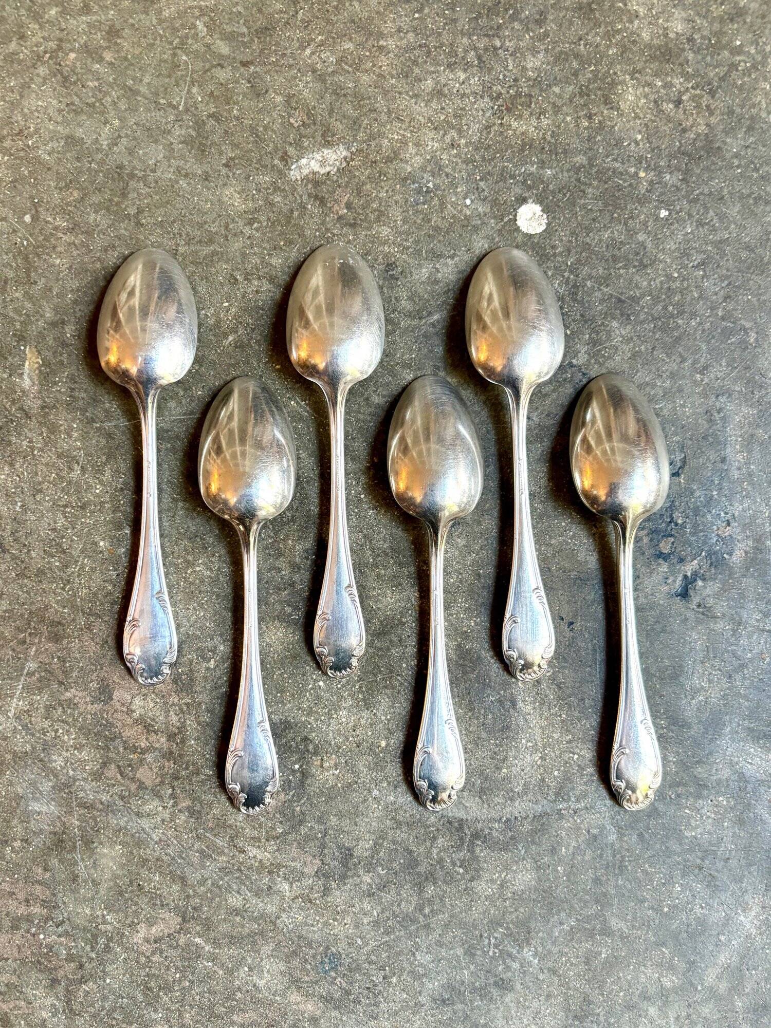 6 small silver metal spoons