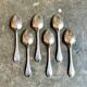 6 small silver metal spoons
