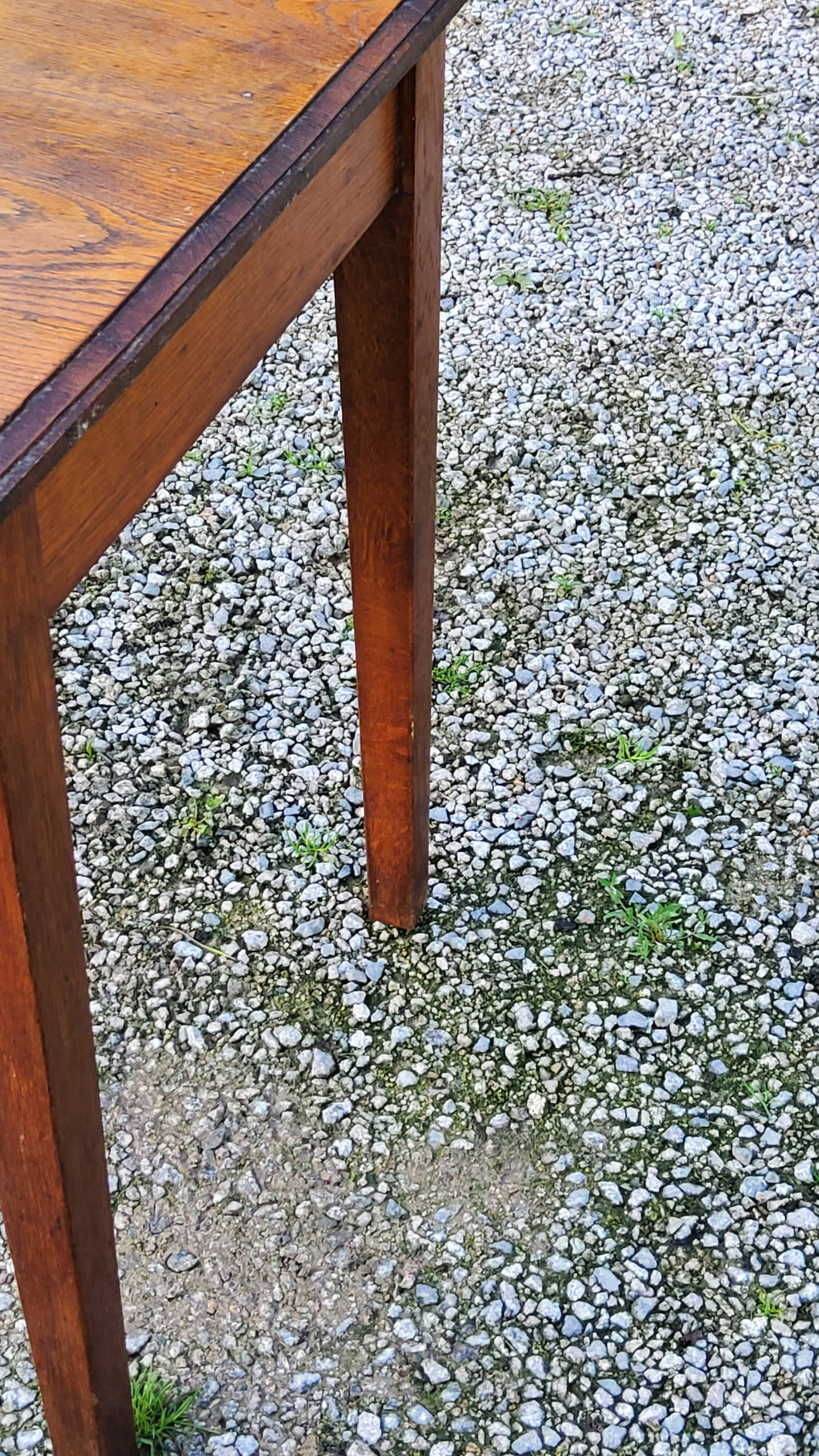 Oak writing table with spindle legs, early 20th century