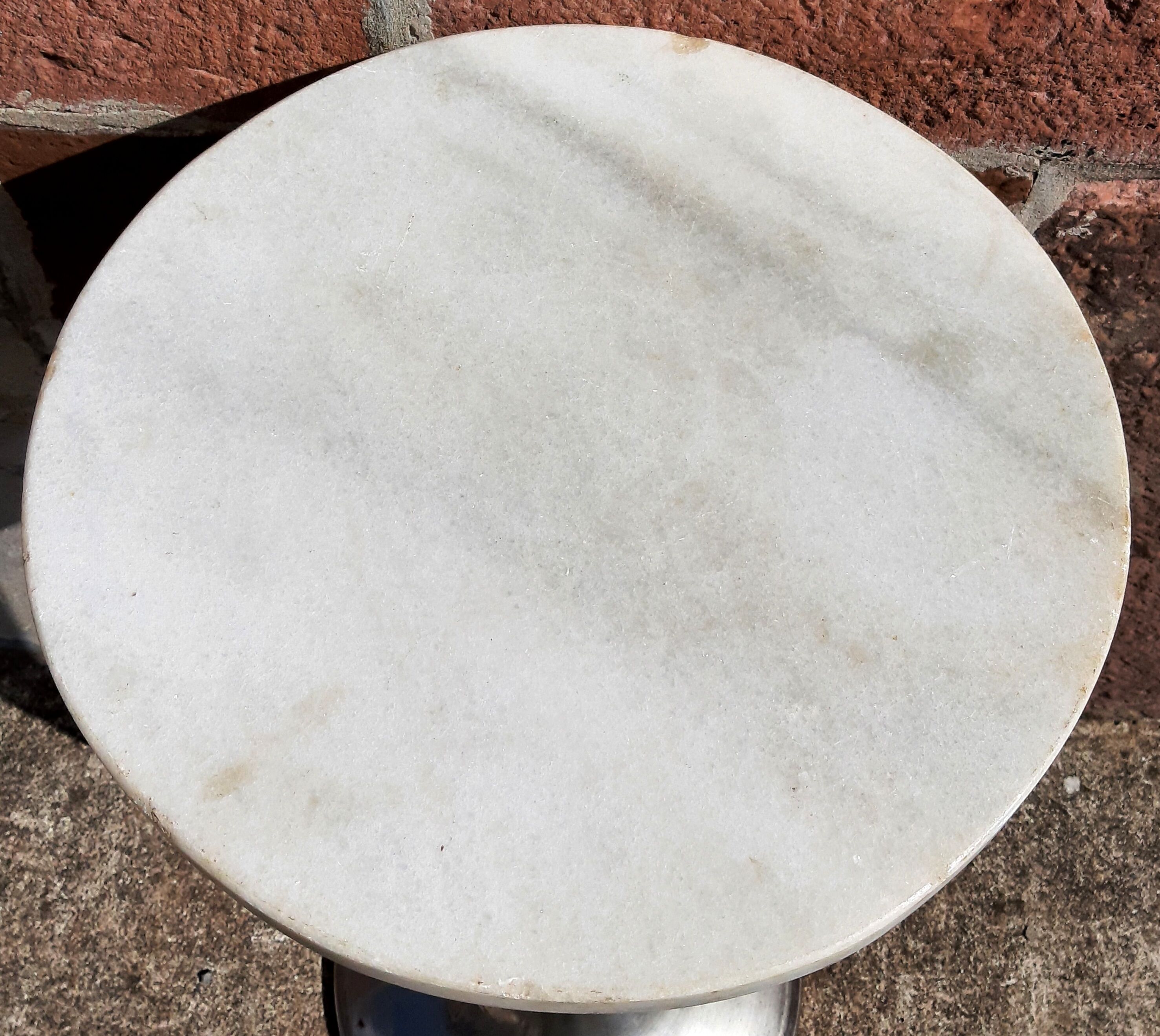 Golden metal selette on marble