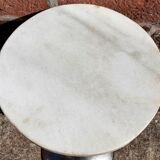 Golden metal selette on marble