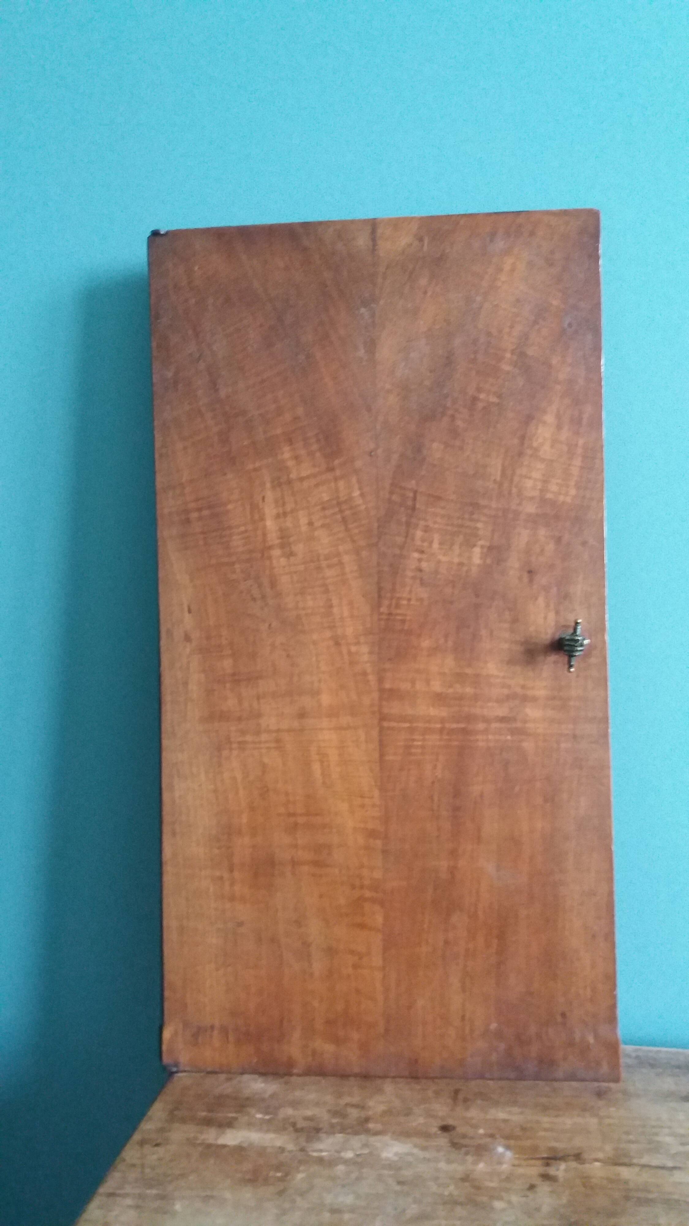 Old door with a bronze handle