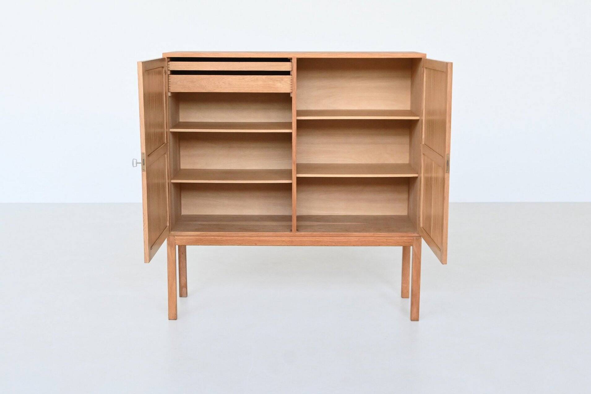 Kurt Ostervig high cabinet in oak A/S Randers Denmark 1960