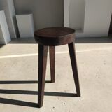 Small high tripod stool in brown solid wood
