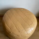 Beige patchwork leather pouf from Sède
