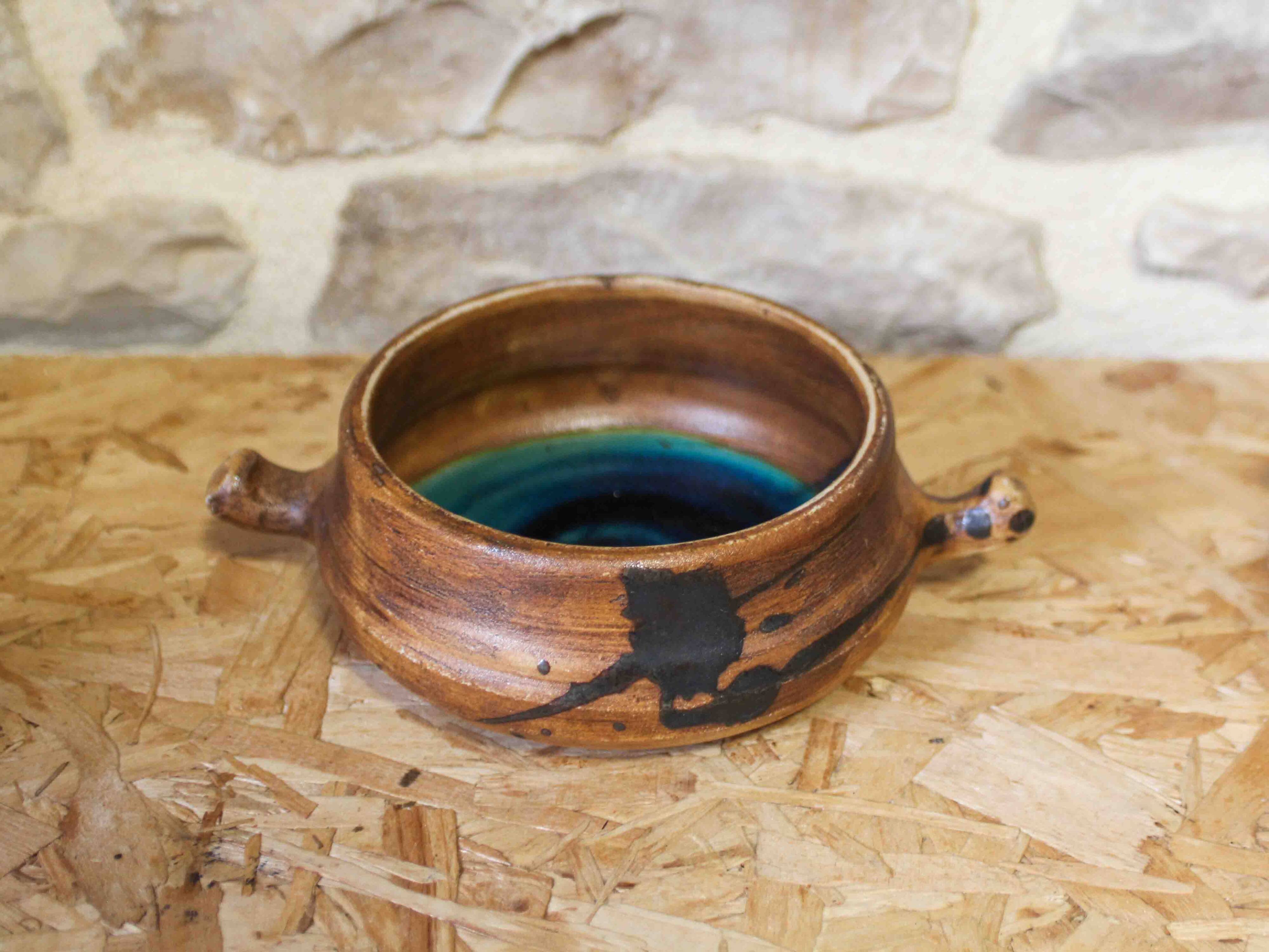 Set of 8 ceramic fondue pots from La Colombe pottery