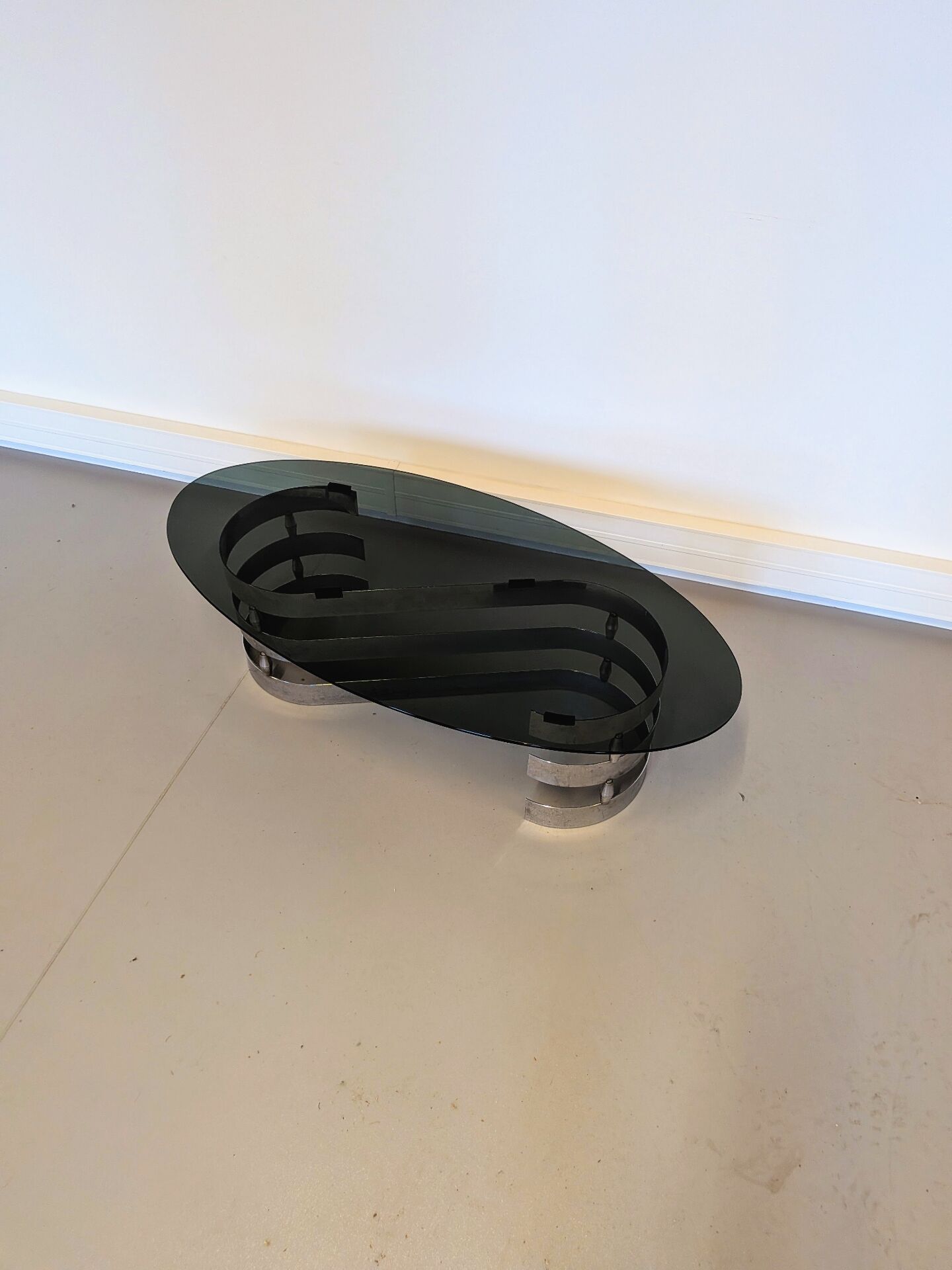 Vintage coffee table in smoked glass designed by Knut Hesterberg.