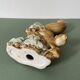 Ceramic squirrel on branch