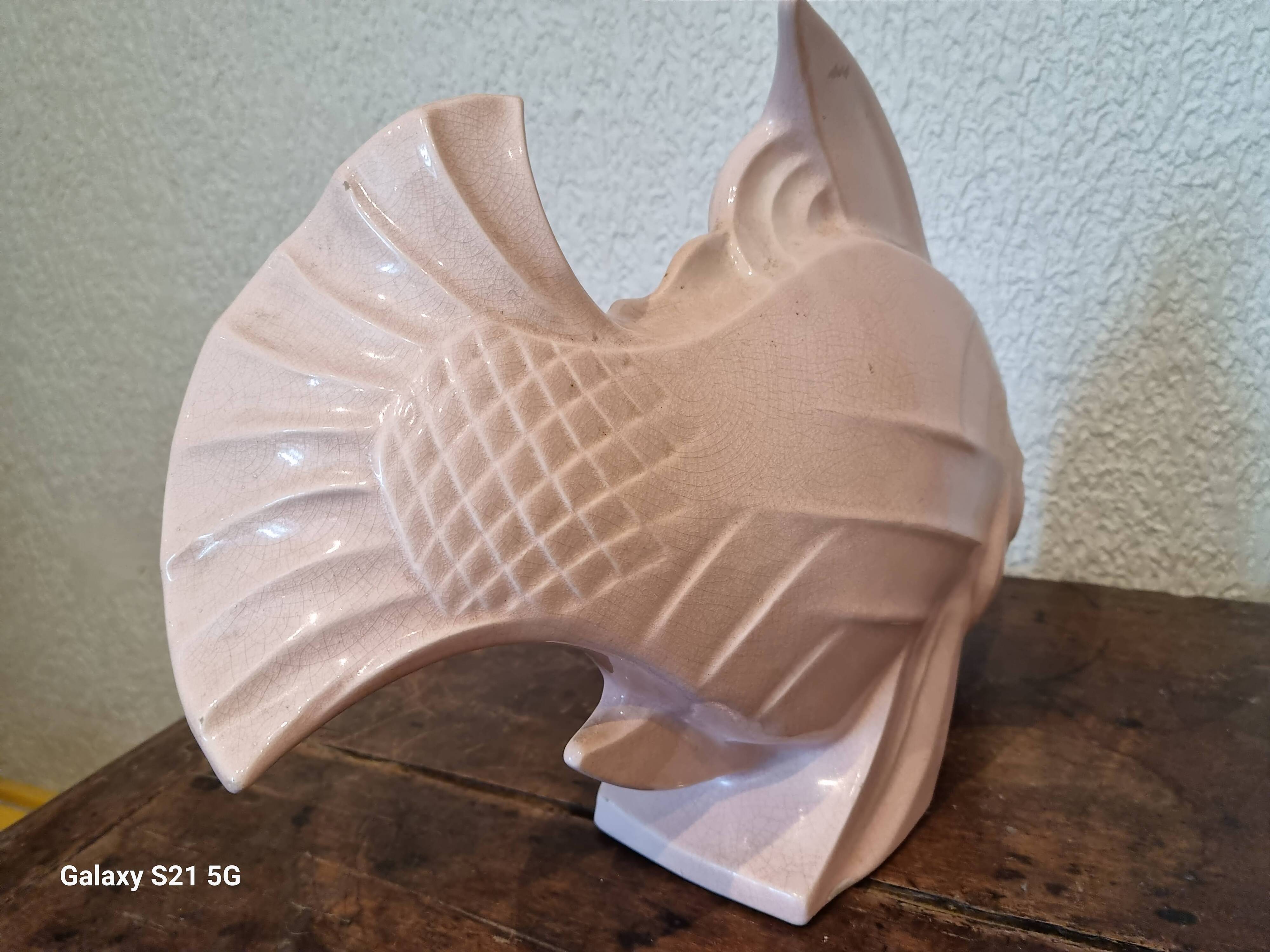 Poisson le jan signe