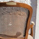 Pair of convertibles caned Louis XV style armchairs