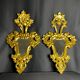Pair of carved and gilded wooden mirrors, Italian Baroque style, 19th century.
