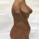 School bust of a female body in red clay terracotta