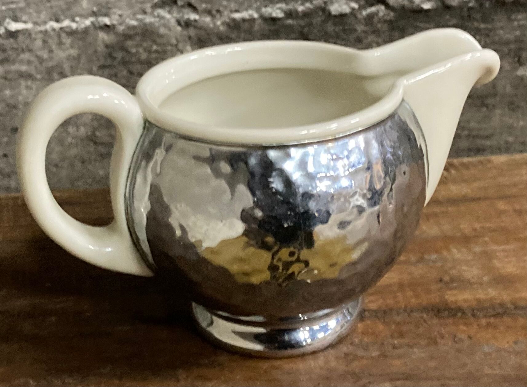 Ceramic/tinned milk jug.