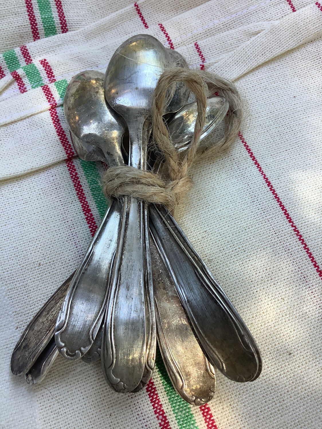 Nine small silver teaspoons