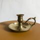 Brass hand-held candlestick