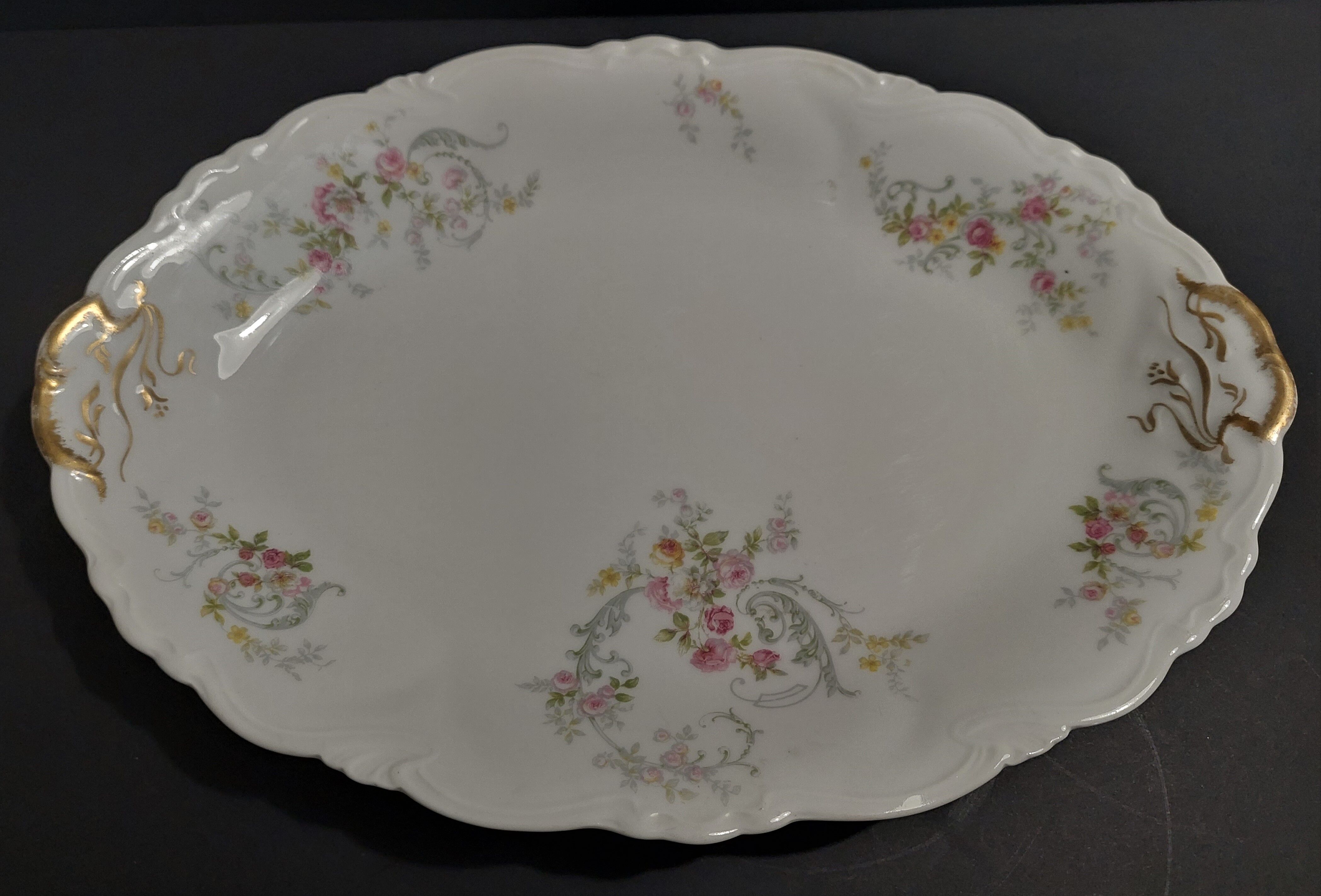 Oval serving dish in porcelain floral decoration Charles Arhenfeldt Limoges
