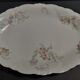 Plat de service ovale en porcelaine décor floral Charles Arhenfeldt Limoges