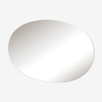 Miroir ovale en verre biseauté et ciselé