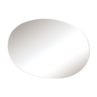 Miroir ovale en verre biseauté et ciselé