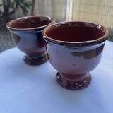 Set of 2 glazed terracotta footed bowls.