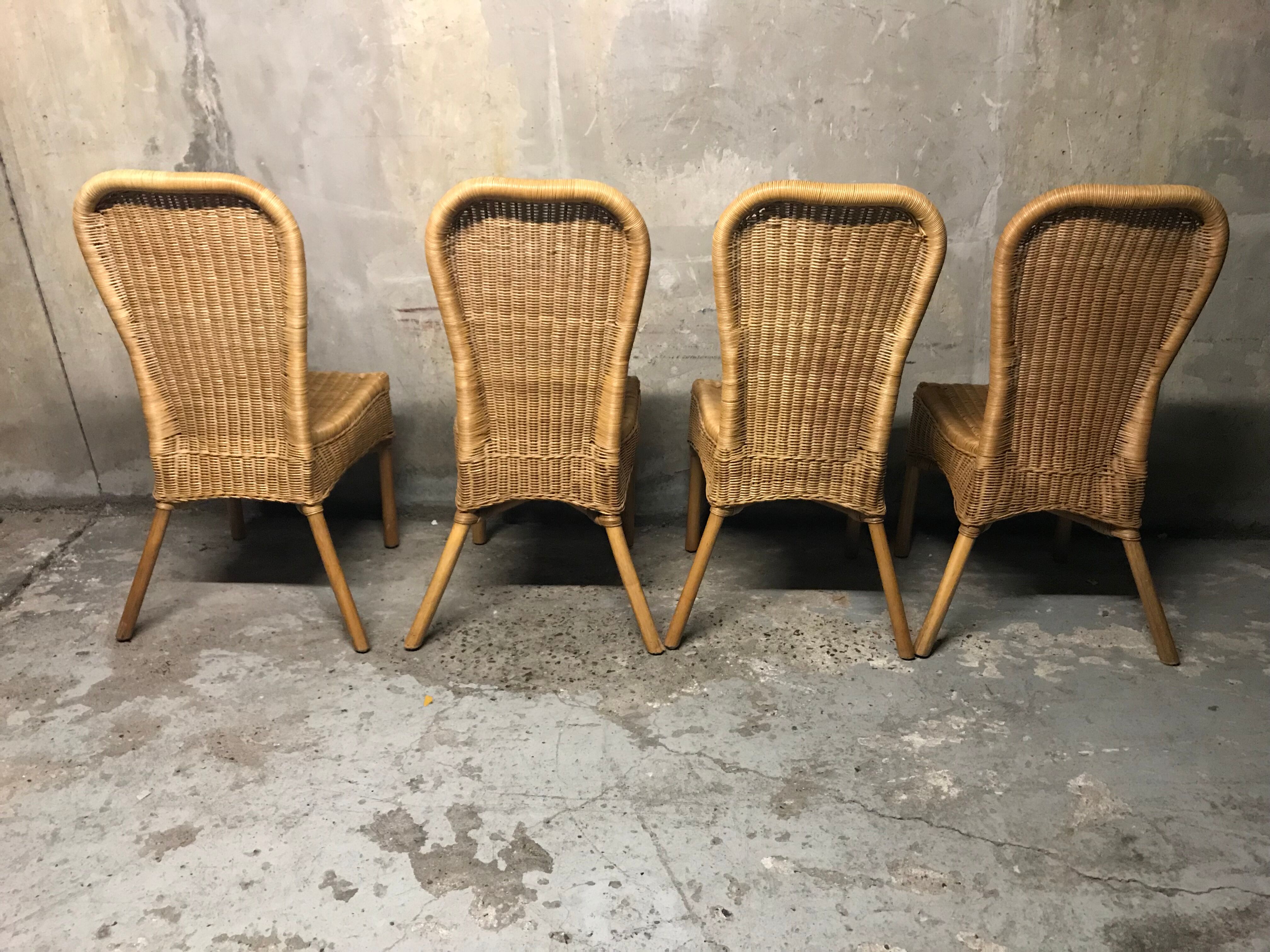 Set of 4 chairs rattan and wicker signed HH
