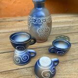 Celtic pattern bottle and mini cups