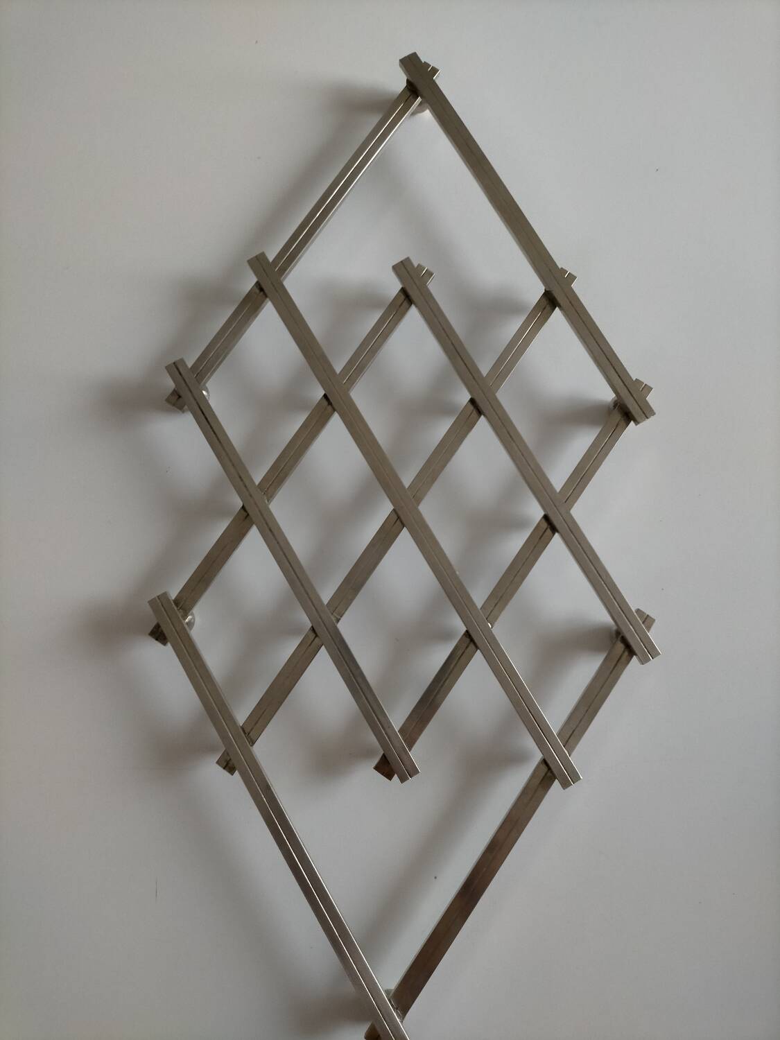 Jacques Adnet metal trivet in very good condition