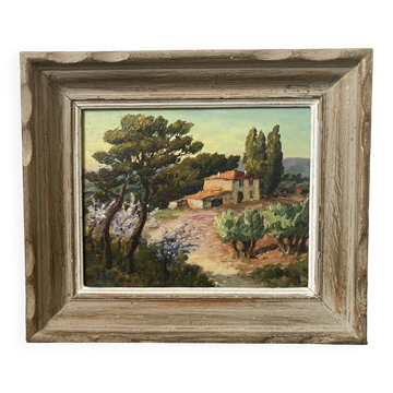 Southern landscape at the bastide painted in oil on hardboard. Signed Rouvier?